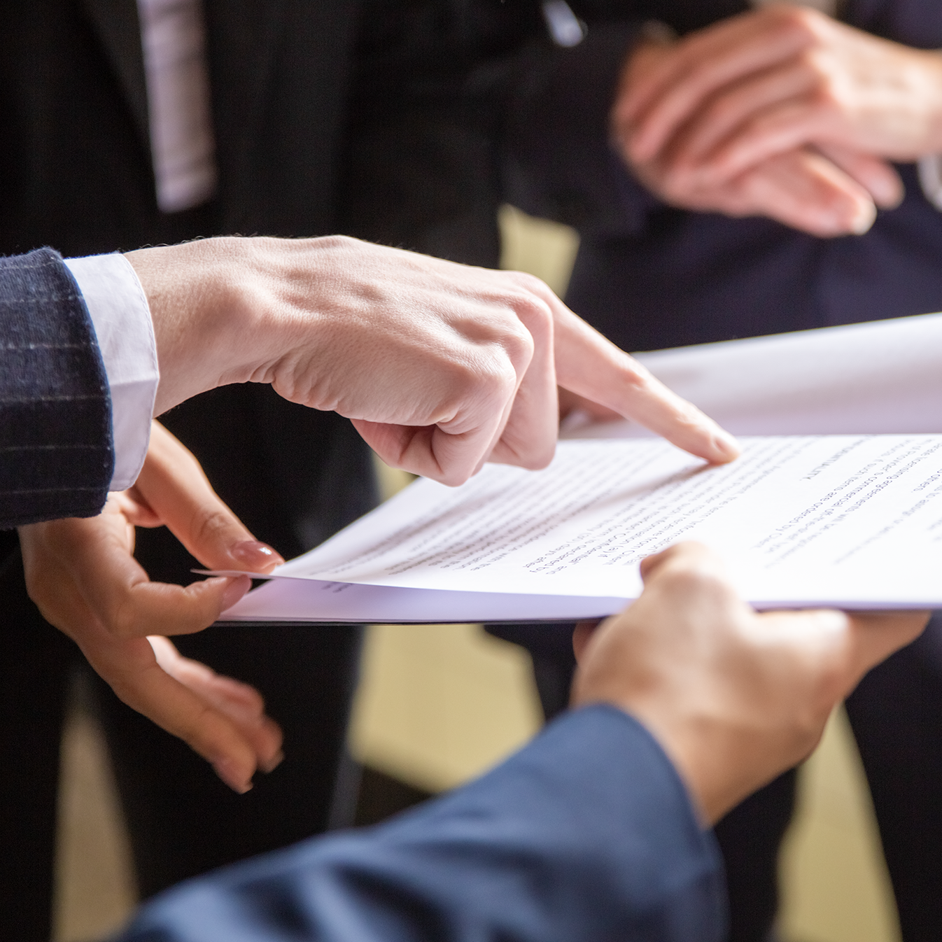 cropped-view-businesswomen-reading-document